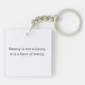 Beauty is Not a Luxury, It is a Form of Mercy キーホルダー (裏面)