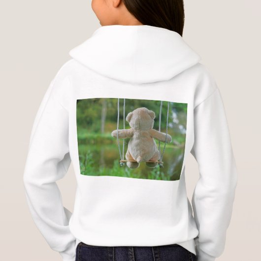 Beer op schommel vanaf de rug. (裏面)