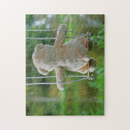 Beer op schommel vanaf de rug. ジグソーパズル (縦)