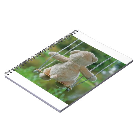 Beer op schommel vanaf de rug. ノートブック (左側)