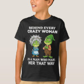 Behind Every Crazy Woman Is A Man Who Made Her Tha Tシャツ (正面)