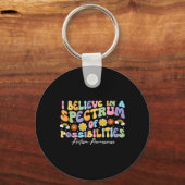 Believe in A Spectrum of Possibilities Autism キーホルダー (正面)