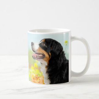 Bernese Mountain dog in the flower garden コーヒーマグカップ