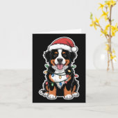 Bernese Mountain Dog Wrapped In Christmas Lights カード (黄色い花)