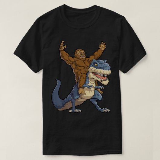 Bigfoot Riding T-Rex Funny Design Tシャツ (デザイン正面)