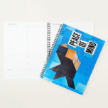 Bird Quilt Pattern Blue Sky Calming Peace of Mind プランナー手帳<br><div class="desc">Create space for clarity, one page at a time. This hardcover planner notebook features a serene blue sky design with a bold bird quilt motif—deep blue with a warm orange center—offering a striking yet peaceful visual balance. The simplicity of the composition invites focus, while the phrase “peace of mind” serves...</div>