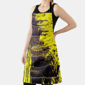 Black abstract splatter paint drips on a bright ye エプロン (インサイチュ)