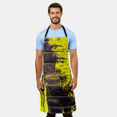 Black abstract splatter paint drips on a bright ye エプロン (着用した状態)