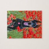 Black and Tan Doberman Pinscher in Red Flowers ジグソーパズル (横)