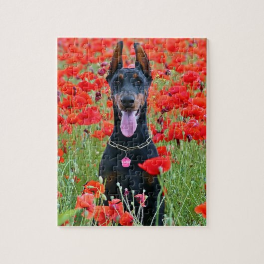 Black and Tan Doberman Pinscher in Red Flowers ジグソーパズル (縦)