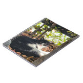 Black and White cat in a bush ノートブック (左側)