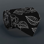Black And White Leafy NeckTie ネクタイ<br><div class="desc">Elevate your evening attire with this striking black necktie, featuring a crisp white floral and leaf motif. The high-contrast botanical print offers a fresh, modern take on traditional floral patterns, making it a versatile piece for weddings, galas, or high-stakes boardroom meetings.</div>