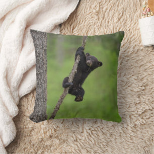 Black Bear Cub playing on Tree Limb クッション