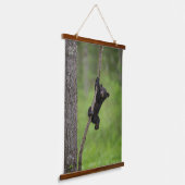 Black Bear Cub playing on Tree Limb 吊り下げ型タペストリー (傾斜あり)
