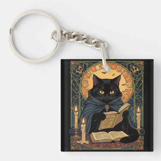Black Cat Reading A Book Of Solstice Spells キーホルダー (正面)