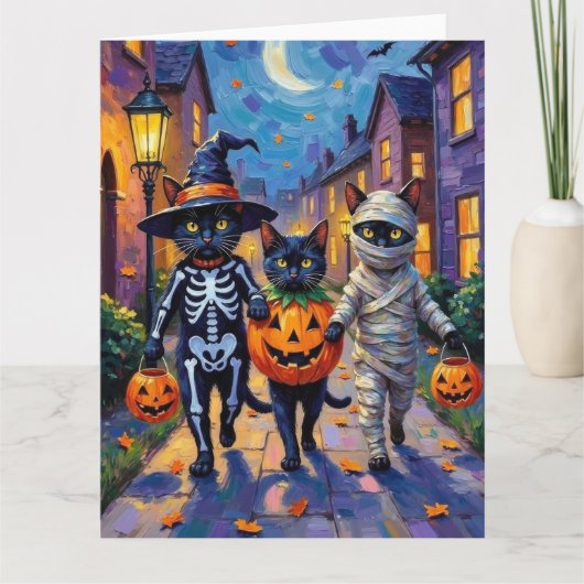 Black Cats Trick-or-Treating in Halloween Costumes カード (正面)