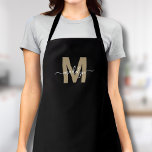 Black Gold Modern Minimalist Elegant Monogram エプロン<br><div class="desc">Personalized Custom Create Your Own Modern Black and Gold Initial Name Monogram Apron. This chic and sophisticated apron is perfect for anyone who wants to add a personalized and elegant touch to their work attire. Whether you're a home chef preparing meals in the kitchen, a hair stylist in need of...</div>