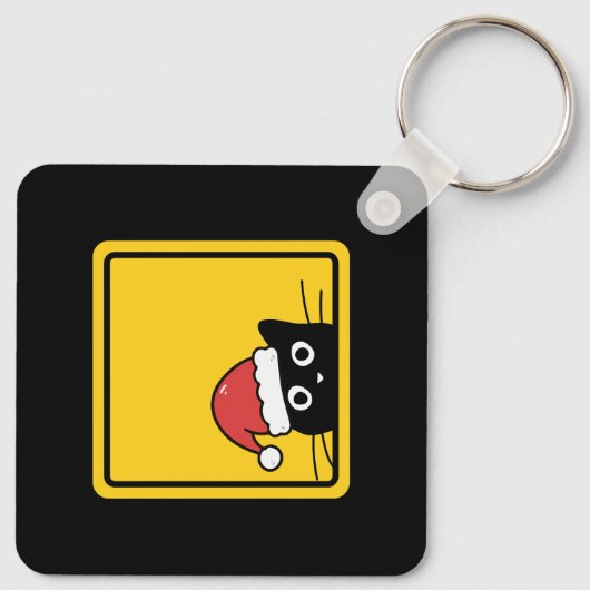 Black Sneaky Santa Cat U.S. Warning Sign キーホルダー (裏面)