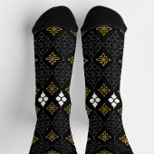 Black socks featuring a gold and white pattern ソックス