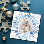 Blue Botanical Hanukkah Family Photo Square シーズンカード<br><div class="desc">Beautiful blue watercolor botanical leaves spring out of your vertical Jewish family photograph for a Happy Hanukkah. Personalize this elegant Chanukah square photo card with a 2nd horizontal picture on the back.</div>