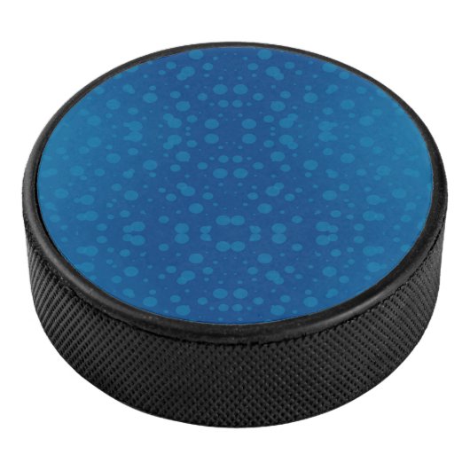 Blue circular product with a polka dot pattern  アイスホッケーパック (3/4)