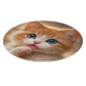 Blue-Eyed Paw licking Kitten カッティングボード (角)