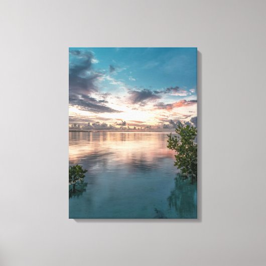 blue sky with red and dark clouds reflected on sea キャンバスプリント (正面)
