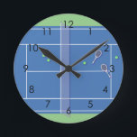 Blue Tennis Court Modern Tennis Player ラウンド壁時計<br><div class="desc">Personalized classic tennis court design in blue with classic, chic, preppy & elegant tennis rackets and green tennis balls. Simple, minimalist gift for your tennis coach or tennis team. Personalized Gift for a tennis player. Blue tennis court illustration. Trendy tennis players home decor. Trendy modern tennis player gifts. Cool retro...</div>