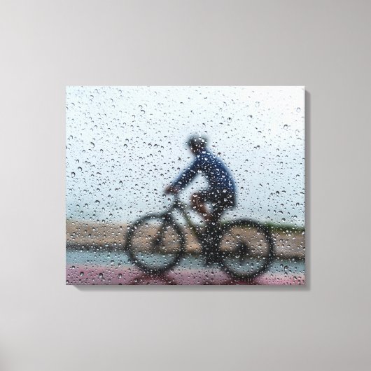 Blurred Cyclist Through Rainy Window キャンバスプリント (正面)