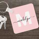 Blush Pink Initial Name Monogram キーホルダー<br><div class="desc">Create Your Own Stylish Modern Custom World Traveler Girly Blush Pink Monogram Square Keychain. This cute square keychain brings a fun and modern touch to your everyday essentials. The design features a bold white monogram initial centered on a soft blush pink background, with your name in elegant black script layered...</div>