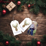 Boho Merry Christmasトナカイタイポグラフィ写真 ギフトタグ<br><div class="desc">Boho Merry Christmas Reindeerタイポグラフィ写真ラベルパステルティール（緑がかった色）、ラベンダー、ピンク、セージの松を〔雄ジカの〕枝角に入れたバックの鹿をフィーチャーした素敵なbohoラベルで、今年の贈り物に特別なtouchを追加。特別なtouchに自分の写真を追加パーソナライズされた。簡単とカスタマイズ文字、フォント、色の使用。ZazzleプロデザイナーBK Thompson ©によるKateの創造専用の作成。お問い合わせ連絡もしは、お問い合わせ、ご質問、またはの仕事についてのお問い合わせカスタムをお願い。</div>