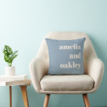 Bold Minimalist Dusty Blue Retro Custom Wedding クッション<br><div class="desc">This personalized pillow features bold serif typography set against a dusty blue background for a modern yet romantic wedding look. The clean layout highlights the couple’s names and wedding date, creating a meaningful piece of decor that feels personal and timeless. Perfect for adding a special touch to a sofa, chair,...</div>