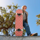 Bold Pink Orange Modern Geometric Check Pattern スケートボード<br><div class="desc">A bold pink and orange checkerboard pattern gives this deck a fun, retro vibe that really stands out at the park. The clean grid design feels both playful and modern, making it great for riders who want color without clutter. Eye-catching, bright, and ready to ride.</div>