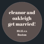 Bold Typography Warm Brown Modern Wedding Custom ラウンドシール<br><div class="desc">This personalized wedding sticker in brown features bold modern typography with a warm,  minimalist layout. Customize the names,  date,  and location to match your celebration details. A versatile option for wedding favors,  envelopes,  welcome bags,  and day-of decor. Designed to coordinate seamlessly with modern and neutral wedding styles.</div>