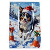 Border Collie Dog Christmas Snow Agility Fun ミディアムペーパーバッグ (裏面)