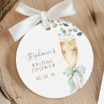 Botanical Champagne Bridal Shower Favor Tags フェイバータグ<br><div class="desc">Celebrate the bride-to-be with these elegant favor tags, featuring a delicate watercolor champagne flute adorned with a soft sage green bow and lush eucalyptus greenery. The design elegantly incorporates the event details and a personalized name, making it a perfect addition to bridal shower favors. These tags add a sophisticated and...</div>
