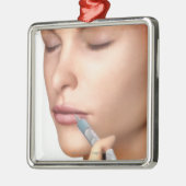 Botoxの注入 メタルオーナメント (左)