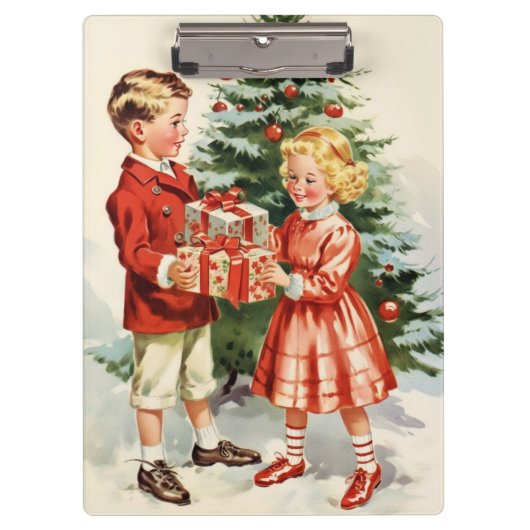 Boy and girl giving each other Christmas presents クリップボード (正面)