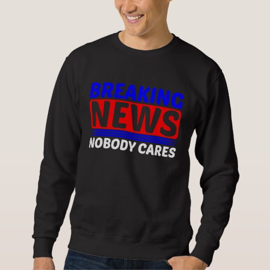 Breaking News Nobody Cares スウェットシャツ (正面)