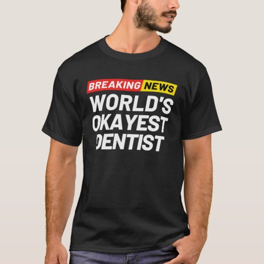 Breaking News World s Okayest Dentist Meaning Dent Tシャツ (正面)