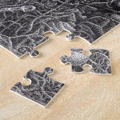 Brian Benson氏による上位と下位 ジグソーパズル (側面)