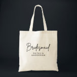 Bridesmaidのミニマルスクリプトパーソナライズされた トートバッグ<br><div class="desc">Script ミニマル Bridesmaid Tote Bagはパーソナライズされたお使いのブライダルパーティの機能スタイリッシュ付きアクセサリーだ。スクリプエレガントトとカスタマイズ可能なtouchを搭載し、運の日常の要結婚件と思い切った思い出に最適。</div>