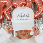 Bridesmaid Modern Minimalist Script Bachelorette キャップ<br><div class="desc">Elevate your bachelorette party style with our "Bridesmaid Modern Minimalist Script" Trucker Hat, a chic and trendy token of gratitude for your bridal party. This hat effortlessly combines contemporary aesthetics with minimalist charm, making it the perfect keepsake for your bridesmaids. Crafted with care, it showcases the word "Bridesmaid" in an...</div>