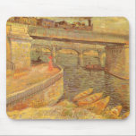 Bridges Across the Seine by Vincent van Gogh マウスパッド<br><div class="desc">Bridges Across the Seine at Asnieres (1887) by Vincent van Gogh is a vintage Post Impressionism fine art seascape daily life painting. A woman standing on the river bank with boats in the water. The bridge has a train on it's way to Paris. Asnieres is a suburb of Paris, France....</div>