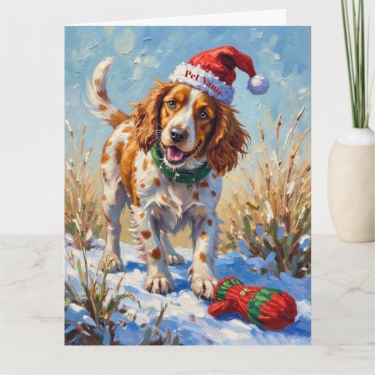 Brittany Spaniel Pointing at Santa's Glove Hat カード (正面)