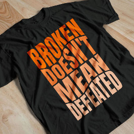 Broken Doesn’t Mean Defeated  Tシャツ