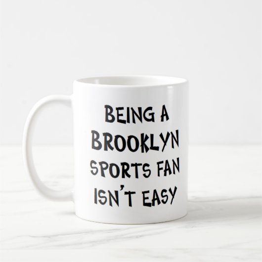 brooklyn sports fan, being コーヒーマグカップ (左)