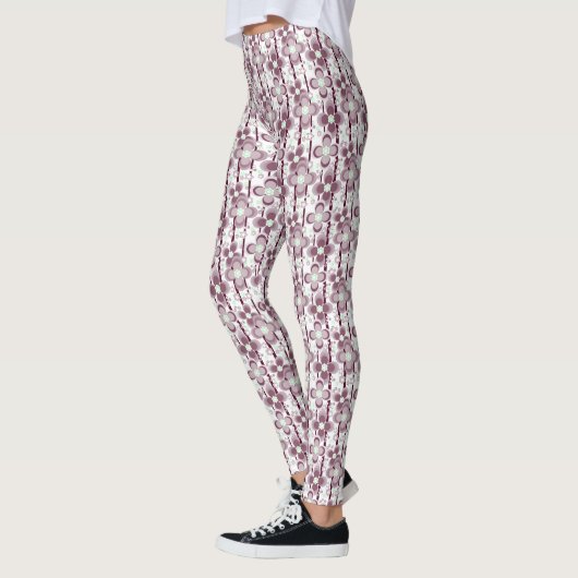 brown and white floral pattern レギンス (左)
