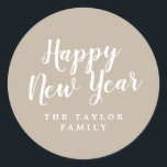 Brushed Tan Happy New Year Holiday Gift ラウンドシール<br><div class="desc">These brushed tan happy new year holiday gift stickers are perfect for a simple holiday present or holiday card. The unique and artistic design features modern calligraphy in beige and white. Personalize the stickers with your name.</div>