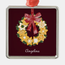 Burgundy背景を持つクリスマスクッキーリース